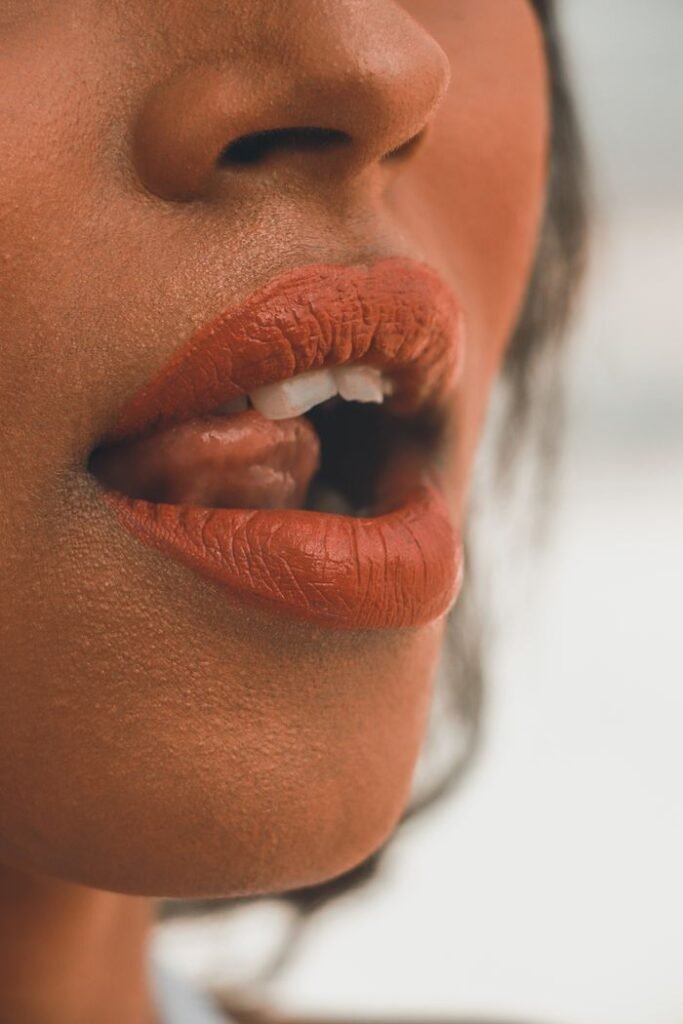 A close-up of a woman's lips with a smooth and textured skin finish, showcasing natural beauty.